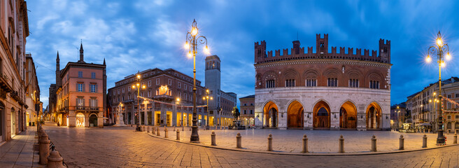 Piacenza - The square Piazza Cavalli at dusk and Palazzo Comunale at dusk. 
