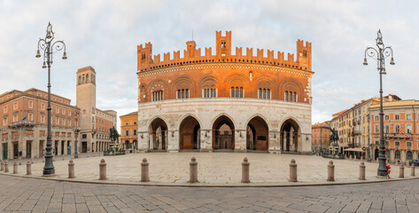 Piacenza - The square Piazza Cavalli at dusk and Palazzo Comunale in the morning light.