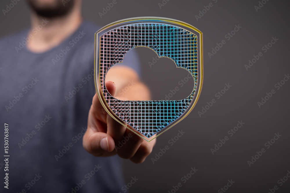 Poster Image of a hand interacting with a digital shield protecting a cloud, symbolizing secure cloud data.