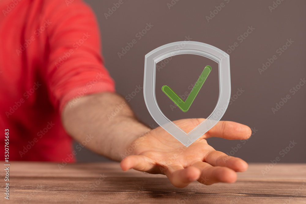 Aufkleber hand holding a digital shield with a checkmark, symbolizing data security and approval.
