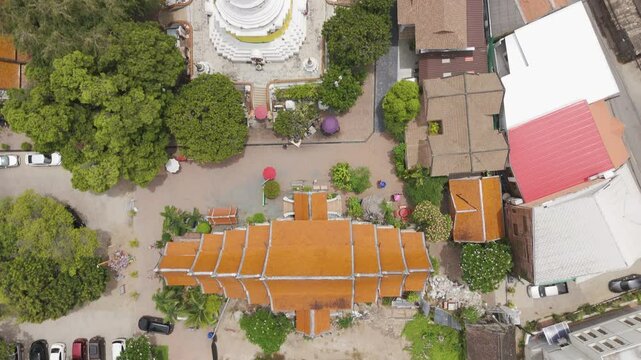 Aerial shot of the Wat Ket Karam, showing the main vihāra and chedi from above.