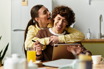 Obraz premium Joyful moments of love shared at home between an adorable couple