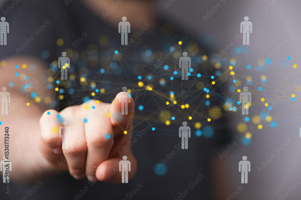 Poster hand interacting with a digital network of interconnected people, representing global communication 