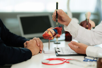 Patient with heart pain consulting a specialist to identify the cause and receive treatment...