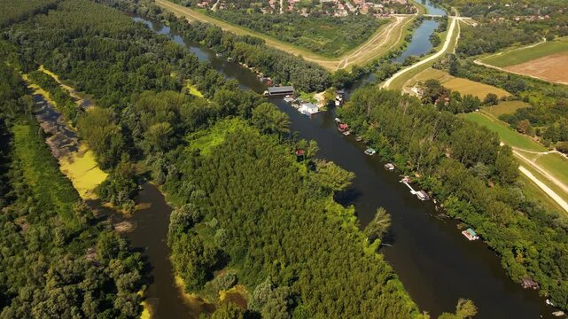 Scenic overview of Ivanovacka ada in Serbia showcasing lush landscapes and waterways