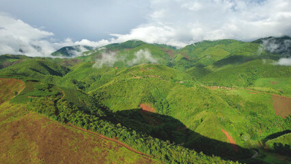 Aerial landscape view of hills and mountain road by drone