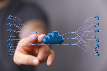 Image of hand interacting with a 3D cloud, representing data connections and global reach in cloud...