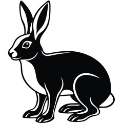 A black hare with white markings is sitting, facing to the left side