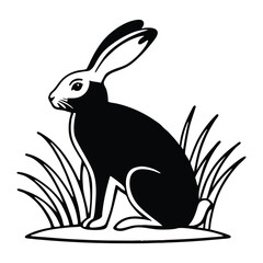 Silhouette of a rabbit sitting in a field of grass is visible here