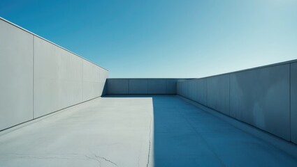 Obraz premium Abstract concrete interior, corner of grungy walls beneath a blue sky