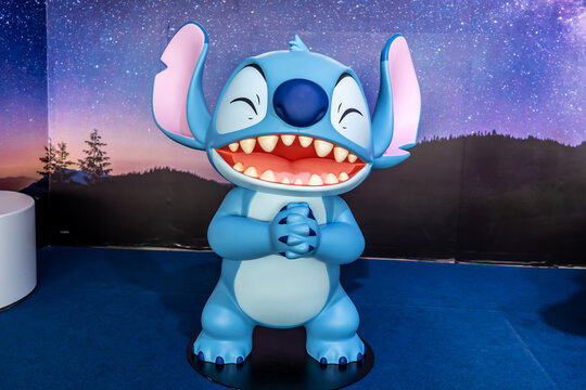 BANGKOK, THAILAND, 09 June 2025 - A cute blue lilo stitch doll of a movie lilo stitch displayed in trendy store, global Disney merchandising trend.