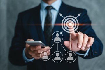 Businessman interacting with a target audience on a smartphone.