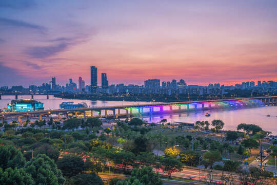 Rainbow Fountain Bridge on the Han River Sunset and night at Banpo Bridge, Seoul, South Korea.