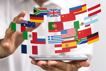 Person holding smartphone displaying flags of various countries, symbolizing global communication...