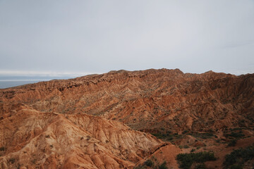Panoramic view of Skazka Canyon red sandstone landscape