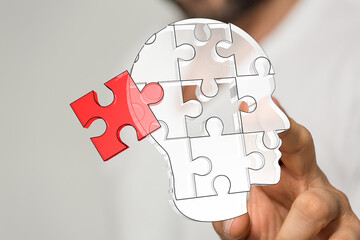 Conceptual image of a puzzle representing the human mind and problem-solving. Ideal for mental...
