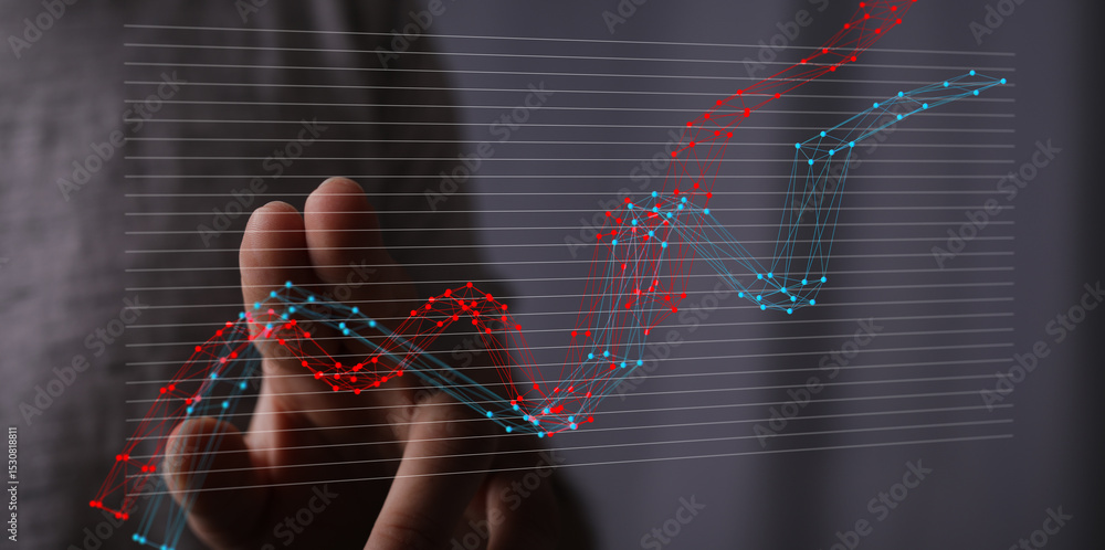 Aufkleber stock photo of a hand interacting with a digital graph showing upward trends and data analysis.