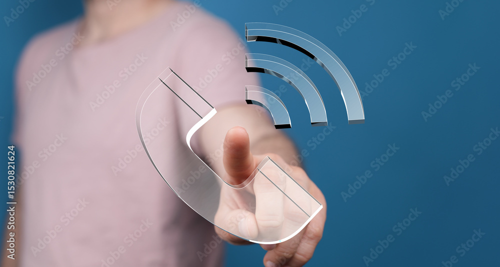 Poster Hand interacting with a transparent phone and wifi symbol.  Concept for communication.