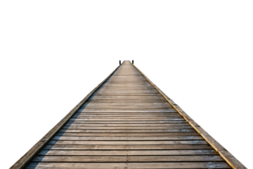 Weathered wooden dock pier extending into misty distance with handrails perspective view, isolated on a transparent background
