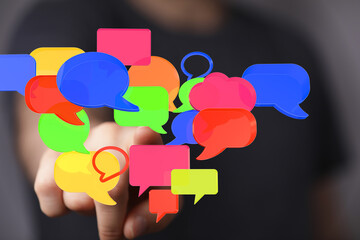 Abstract image of colorful speech bubbles, symbolizing communication, conversation, and social...