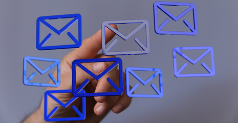 Abstract image of a hand interacting with email icons.  Perfect for digital communication,...