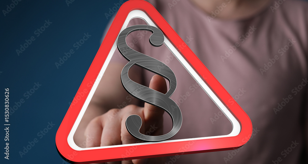 Aufkleber Stock photo of a hand pointing at a digital red triangle warning sign with a paragraph symbol.  Perfect for legal, law, and regulation concepts.