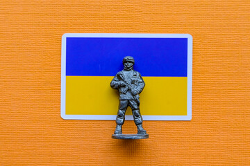 Flags of Ukraine on a yellow background. The Russian-Ukrainian conflict.
