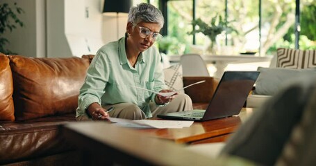Documents, stress and laptop with old woman on sofa for retirement savings loss, bankruptcy and audit. Insurance fraud report, worry and debt review with senior person in living room of home