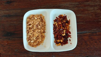 Chili flake and ground peanut.