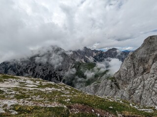 Panoramic view of Logarska dolina valley with peaks of Slovenian Alps covered by passing clouds. © Semi