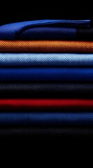 Stacked colorful fabric swatches, dark background, textile design