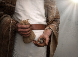 Ancient man with silver coins