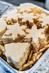 Baking Snowflake-Shaped Sugar Cookies for Homemade Christmas Gifts