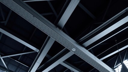 Industrial warehouse interior with metal beams and trusses