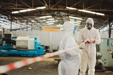 red barrier cross tape : No trespassing. man workers Officials from the Department of Hazardous...