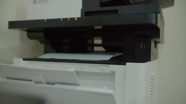 Blinking printer button and paper output tray