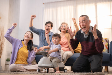 Family celebration with joyful moments and children playing together in a cozy living room