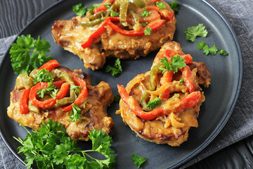pork chops topped with bell pepper cream gravy