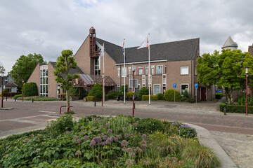 The Gemeentehuis Zederik (Zederik Municipal Office) in Meerkerk, Netherlands, is a modern brick building serving the local community. Meerkerk, Netherlands, 22 May 2025.
