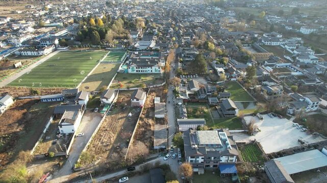 Soar above Baisha Ancient Town and witness its timeless beauty from the sky. Traditional rooftops stretch across the valley. Mountains embrace the horizon. A hidden gem waiting to be explored by curio