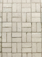 Light Gray Brick Paving Surface for Outdoor Pathway or Sidewalk