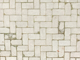 Light Grey Brick Paved Sidewalk in Urban Area