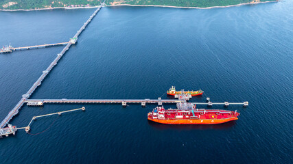 Aerial view LPG gas tanker ship at oil and gas terminal platform, Liquefied Petroleum Gas tanker ship industrial offshore oil gas terminal tanker ship LPG tanker ship loading arm loading and unloading