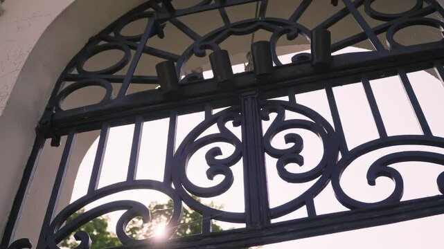 Exploring the ornate gate of dvorac dundjerski in serbia during the afternoon