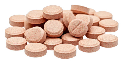 Obraz premium Pile of small, round, peach-toned pills