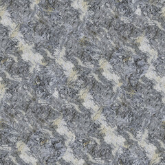 A marbled stone surface in gray, beige, and white with swirling organic patterns and layered mineral texture.