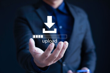 Businessman holding icon, upload in hand, uploading data, data transmission technology
