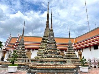 Fototapeta premium Wat Pho or Pho temple, an ancient temple, Buddha, Wat Phra Chetuphon Wimon Mangkhalaram, Buddhism, religion, architecture, exterior, Bangkok, Thailand, Thailand Destination