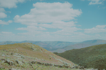 mountain landscape with blue sky and clouds