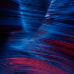 Abstract blue and red swirling motion blur background